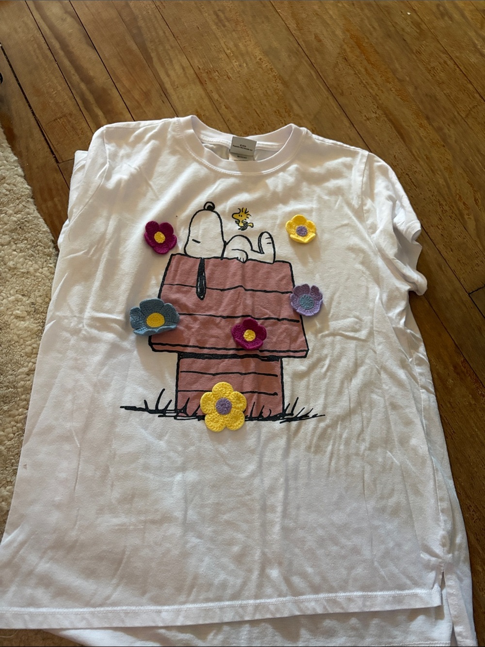 Peanuts White Snoopy Graphic Tee with Colorful Flower Appliqués